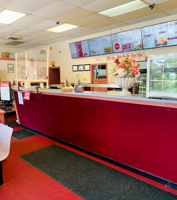 The storefront of Brando's Pizza & Subs in Lowell, MA